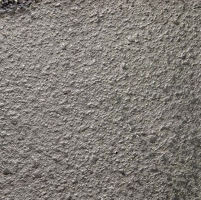 Nærbilde av malingsstrukturen på M40 hjelmen over. Maling med grov tekstur. 